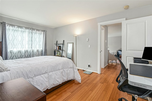 bedroom featuring light hardwood / wood-style floors