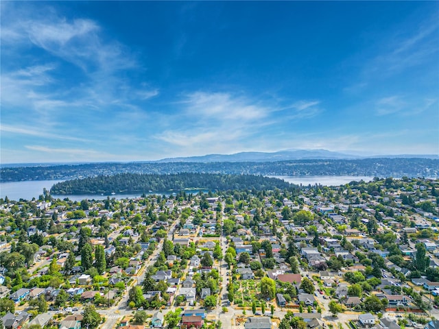 bird's eye view featuring a water and mountain view