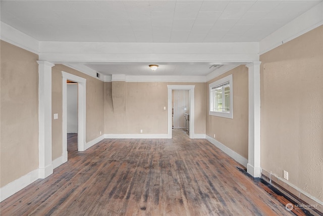 unfurnished room with dark hardwood / wood-style floors