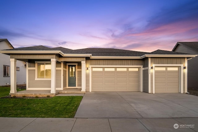 prairie-style home featuring a garage