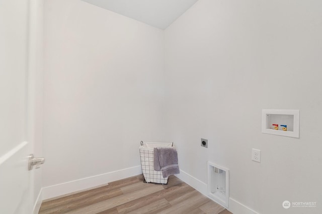 laundry area featuring washer hookup, light wood-type flooring, and electric dryer hookup