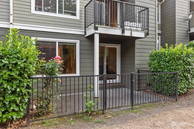 doorway to property with a balcony