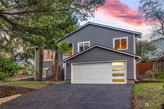 view of front of property with a garage