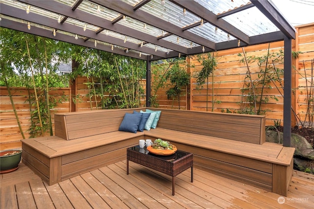 wooden deck with a pergola