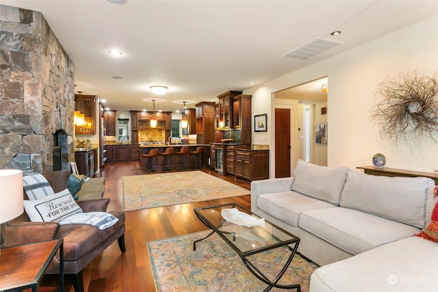 living room featuring dark hardwood / wood-style floors