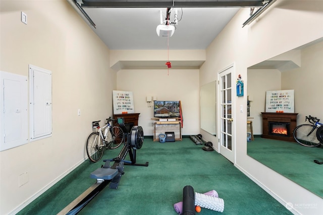 workout area with carpet flooring and electric panel