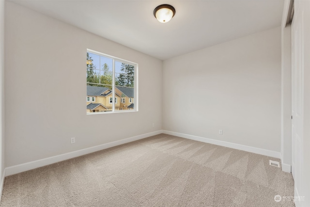 view of carpeted spare room