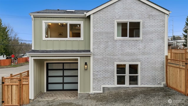 view of front of property featuring a garage