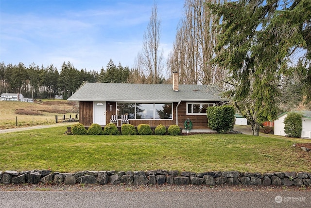 view of front facade with a front yard