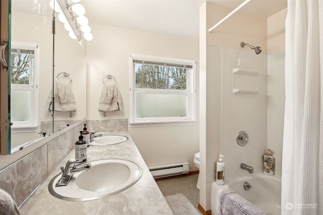 full bathroom featuring baseboard heating, shower / bath combo with shower curtain, vanity, and toilet