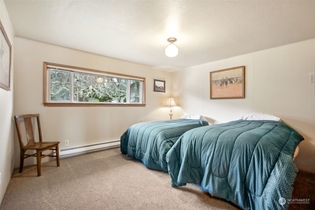 bedroom featuring carpet flooring and a baseboard radiator