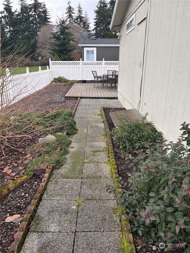 view of yard with a wooden deck