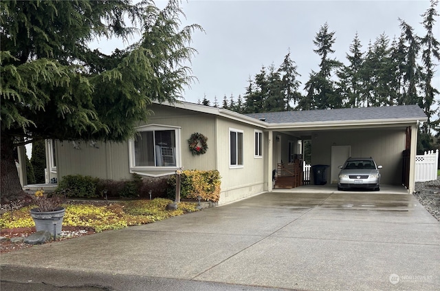 view of front facade with a carport