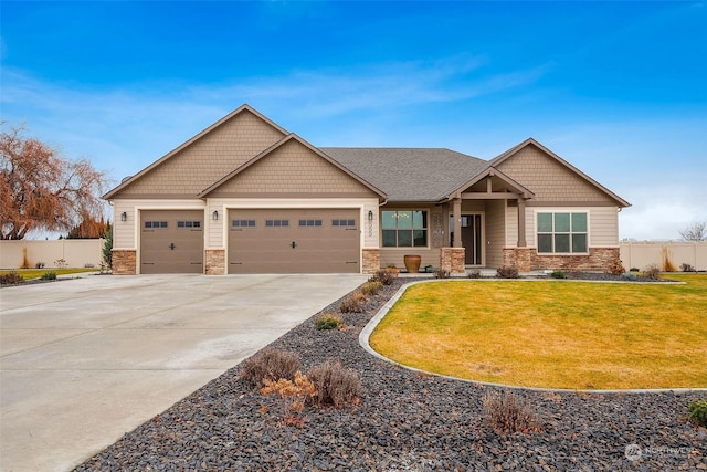 craftsman-style house with a front lawn and a garage