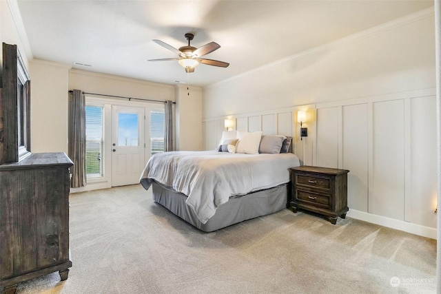 bedroom with ceiling fan, light colored carpet, ornamental molding, and access to exterior