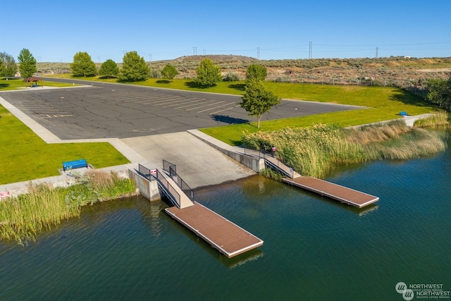 dock area featuring a water view