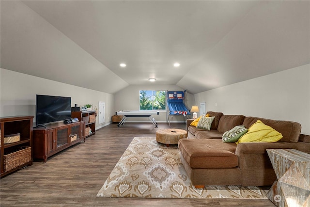 living room with hardwood / wood-style floors and lofted ceiling