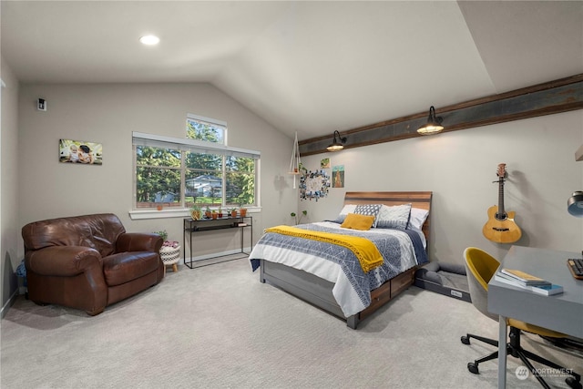 bedroom featuring vaulted ceiling and carpet floors