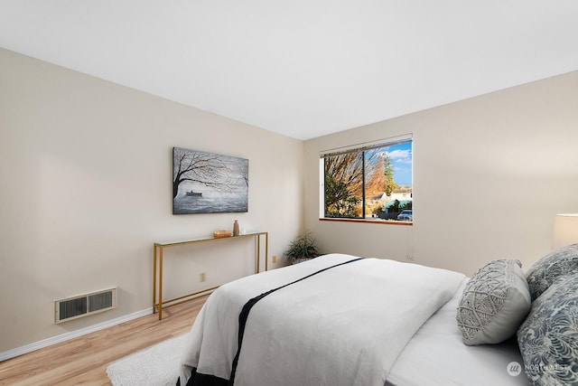 bedroom featuring light hardwood / wood-style flooring