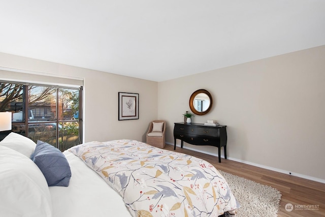 bedroom with wood-type flooring