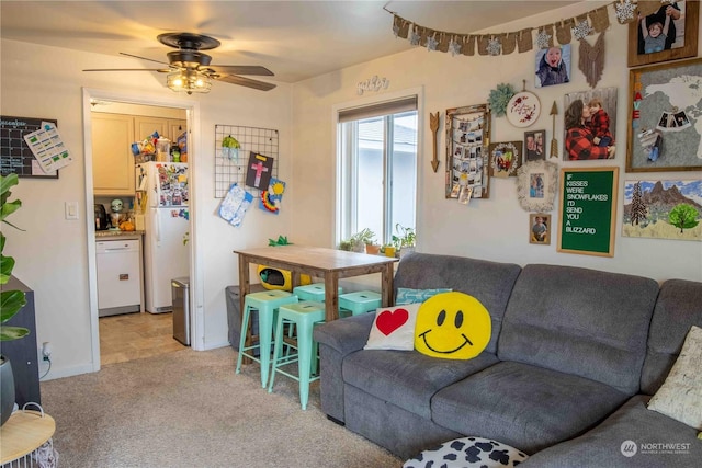 living room featuring light colored carpet and ceiling fan