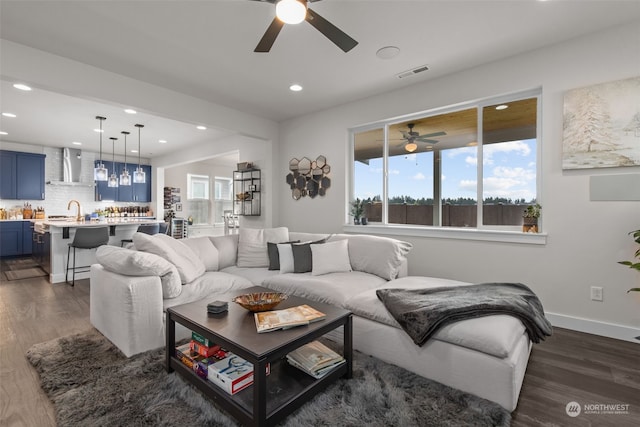 living room featuring dark wood-type flooring