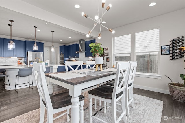 dining room with a chandelier and dark wood-type flooring