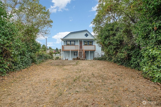 view of front of house with a wooden deck