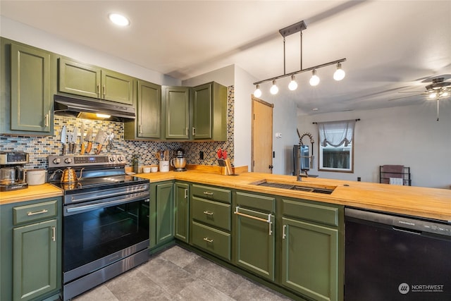 kitchen with dishwasher, electric stove, sink, green cabinetry, and decorative light fixtures