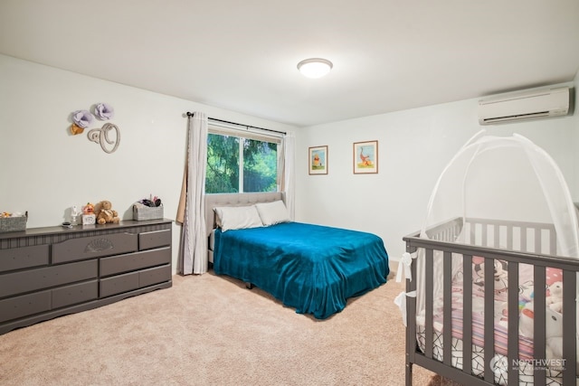 carpeted bedroom featuring a wall mounted air conditioner