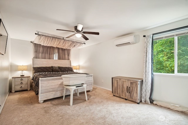 carpeted bedroom featuring a wall mounted air conditioner and ceiling fan