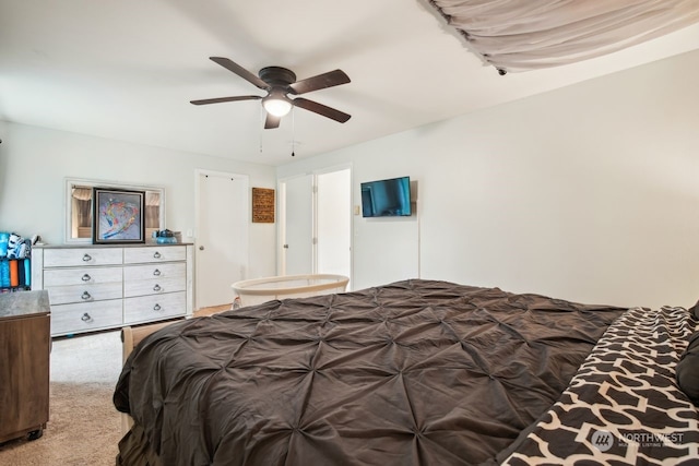 bedroom with ceiling fan and carpet floors