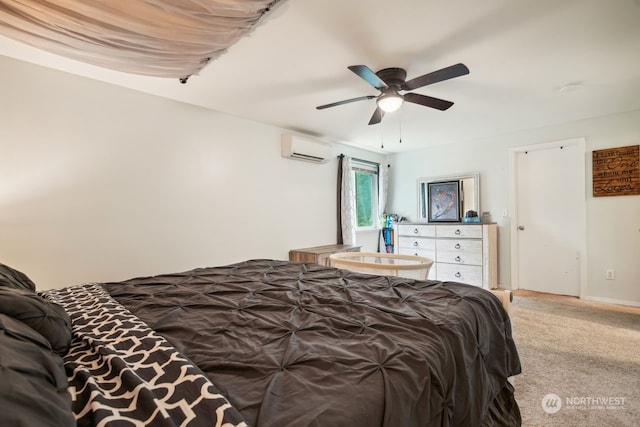 bedroom with carpet, ceiling fan, and a wall mounted air conditioner