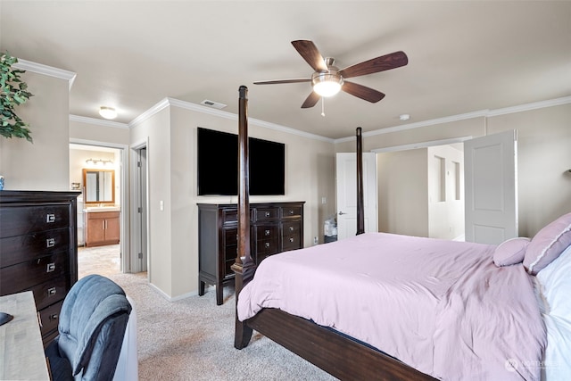 bedroom featuring light carpet, connected bathroom, ceiling fan, and crown molding