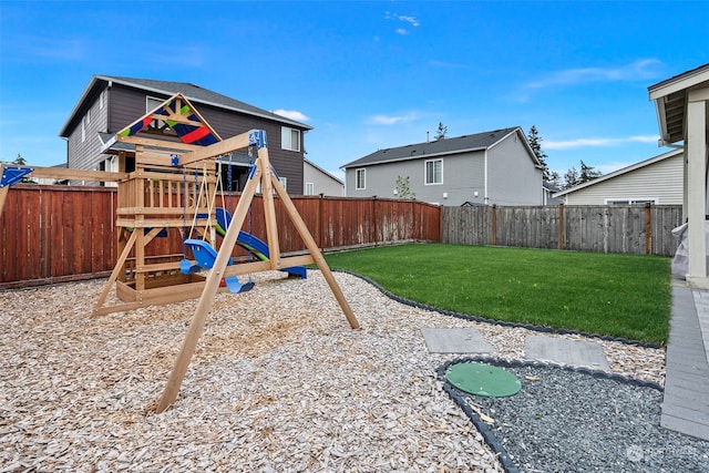 view of playground with a yard