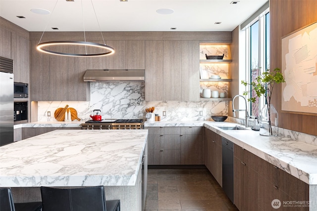 kitchen with open shelves, under cabinet range hood, stainless steel appliances, and light countertops