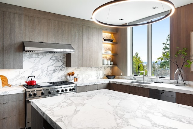 kitchen featuring modern cabinets, high end stainless steel range, under cabinet range hood, open shelves, and a sink