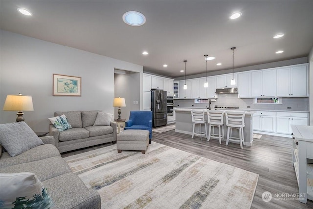 living room with wood-type flooring