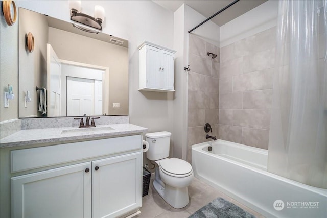 full bathroom with toilet, vanity, tile patterned flooring, and shower / bath combo with shower curtain