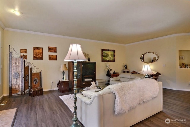 living room with dark hardwood / wood-style flooring and crown molding