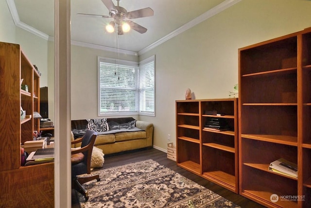 living area featuring dark hardwood / wood-style floors, ceiling fan, and crown molding