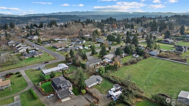 bird's eye view with a mountain view