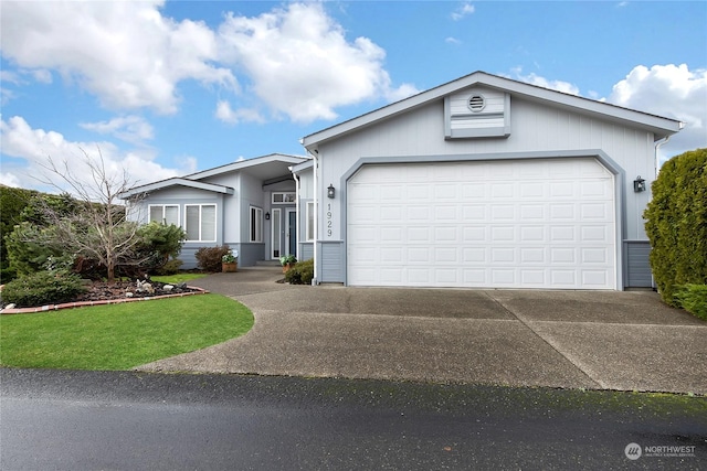 ranch-style home with a garage