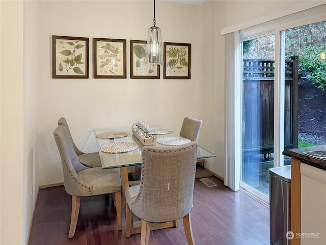 dining room featuring dark hardwood / wood-style floors