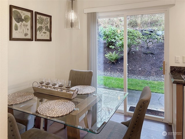 dining room with light hardwood / wood-style flooring