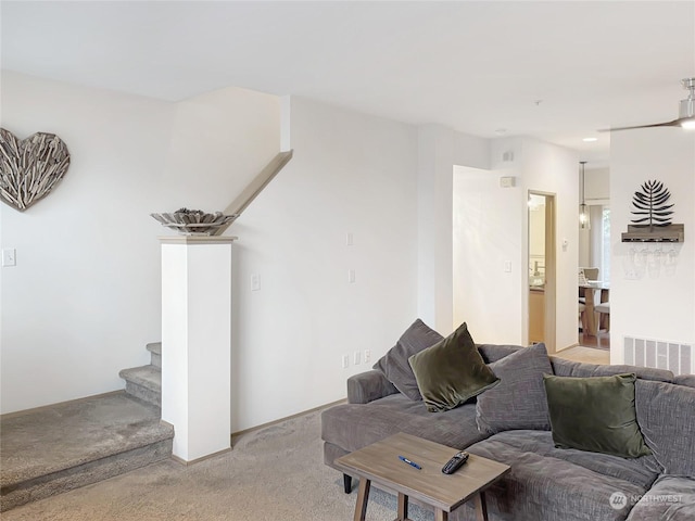 living room featuring carpet floors