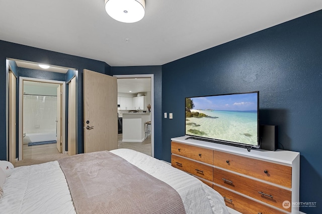 bedroom with ensuite bath