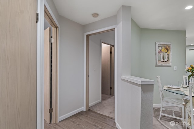 corridor featuring light wood-type flooring