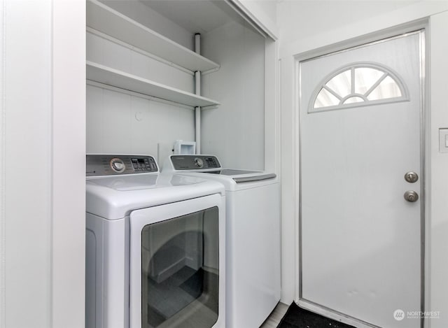 laundry area featuring separate washer and dryer