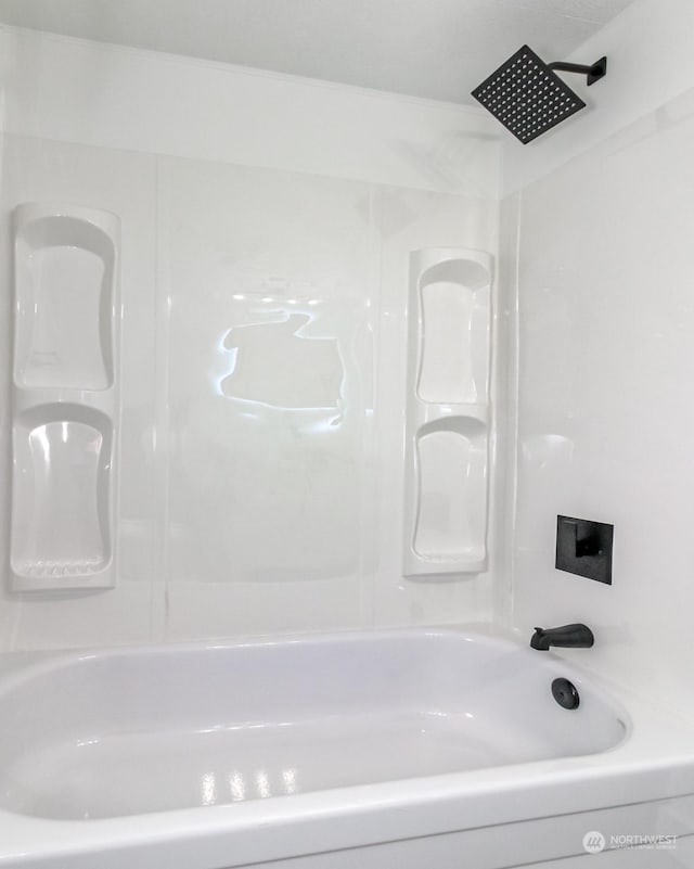 bathroom with shower / bathing tub combination